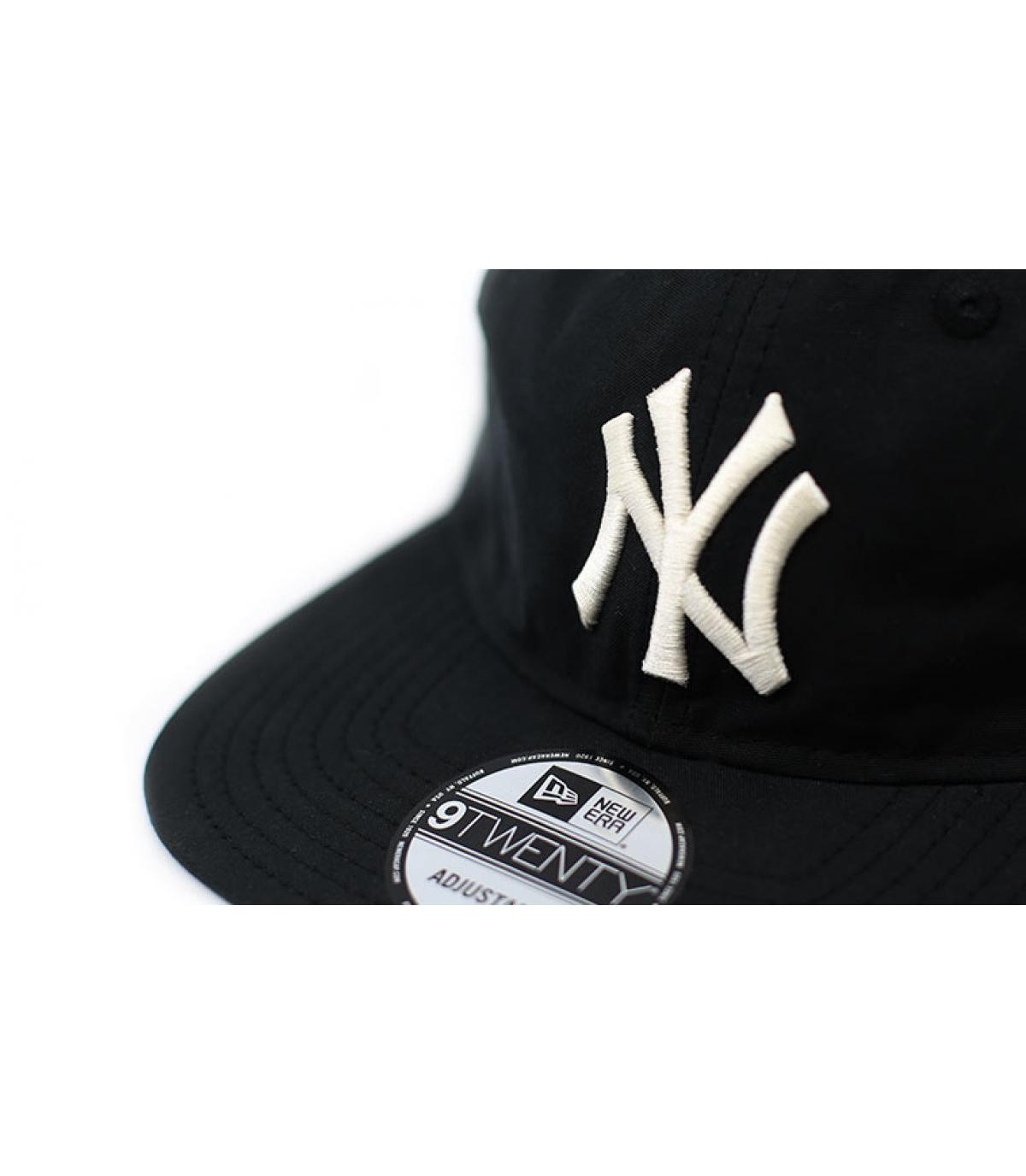 black packable NY cap